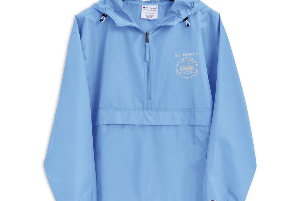 Light blue hooded pullover jacket on hanger
